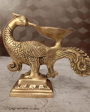 Brass Peacock Holding Diya-4.2″