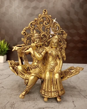 Brass Radha Krishna Idol Sitting Designer Sofa 10 Inch – Premium Handmade Brass Statue for Home Decor & Pooja