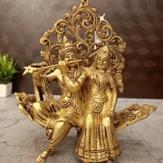 Brass Radha Krishna Idol Sitting Designer Sofa 10 Inch – Premium Handmade Brass Statue for Home Decor & Pooja